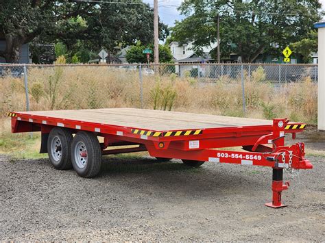 3500 and skid steer on deckover gooseneck|20x16 deckover trailer.